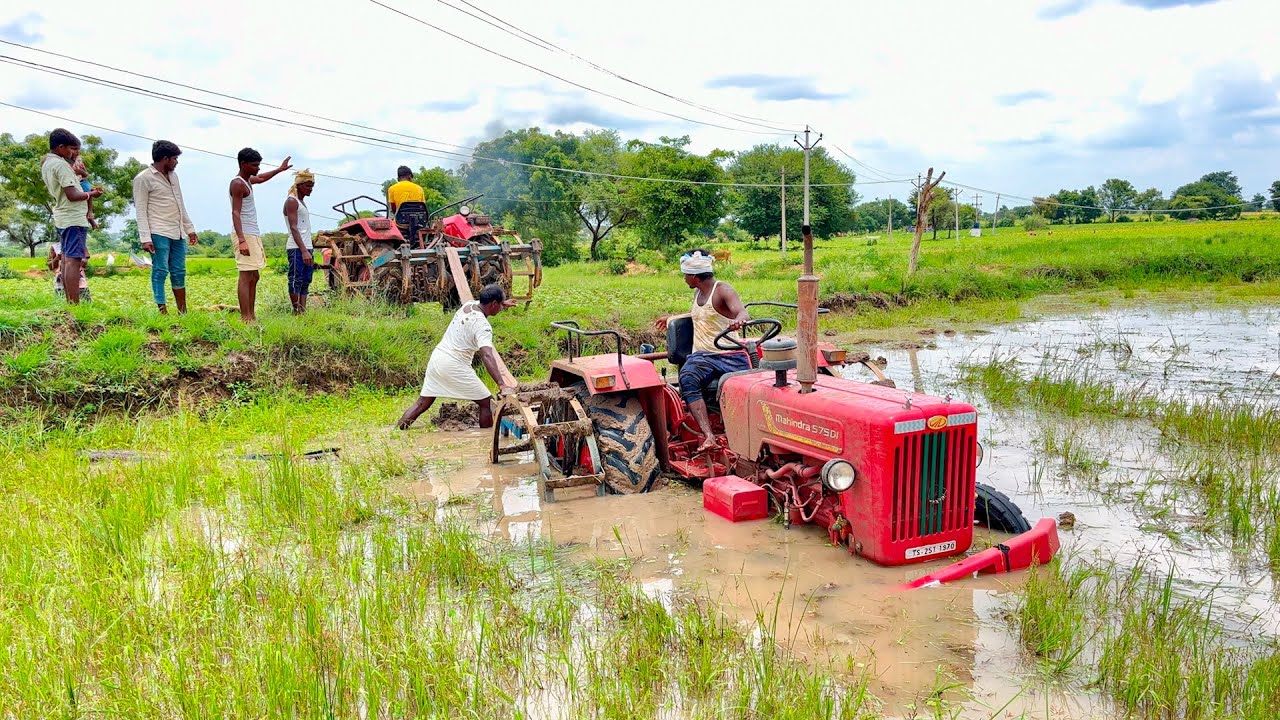 Mahindra 575DI tractor stuck in mud Rescued by another Mahindra tractor