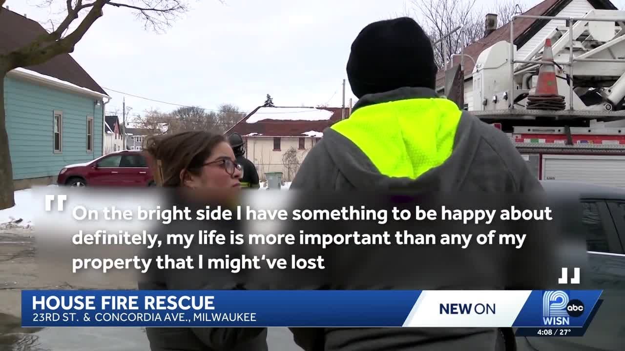 Man escapes Milwaukee house fire through 2nd-story window rescue