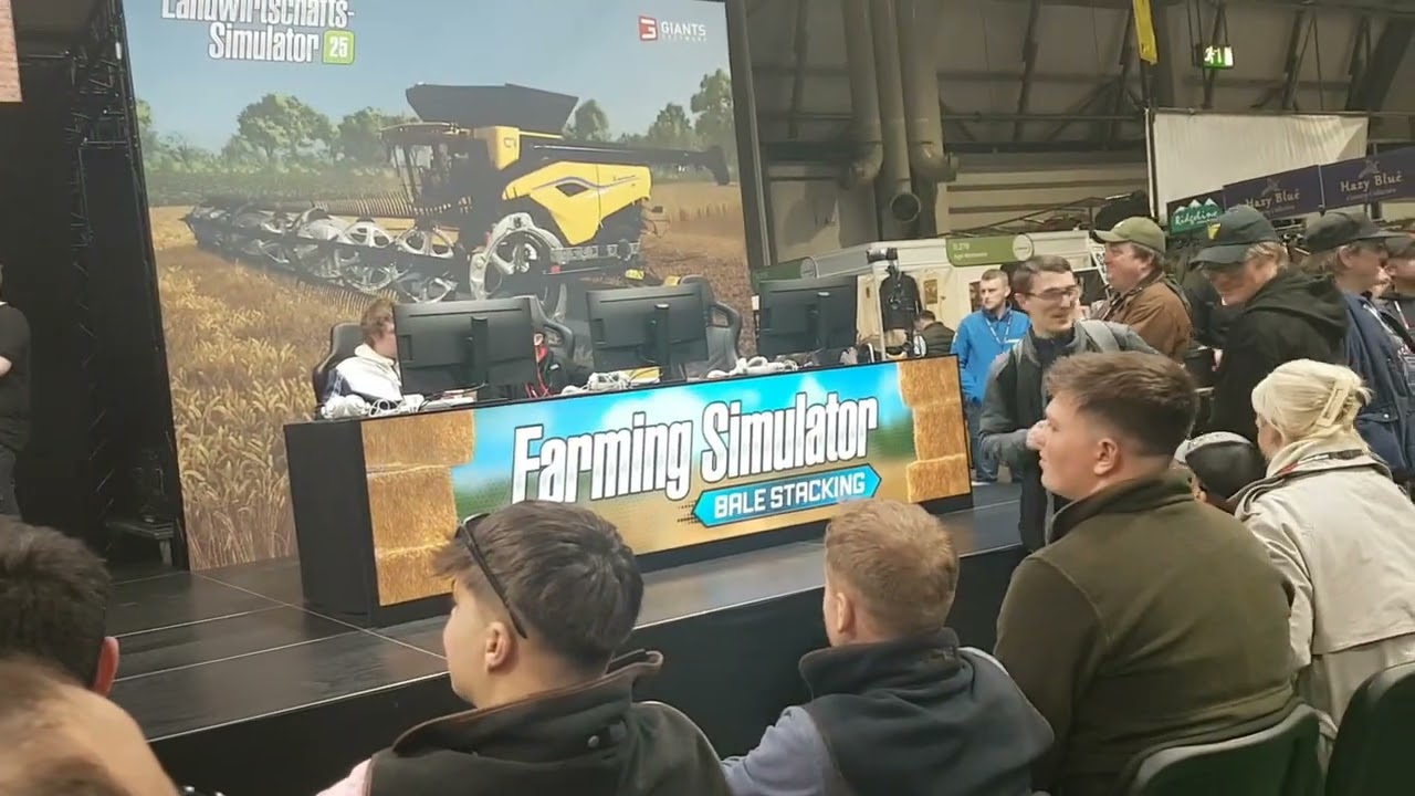 UNEDITED Bale Stacking @ Giant's Software stand at LAMMA 2025. With Kaleb Cooper Stopped.