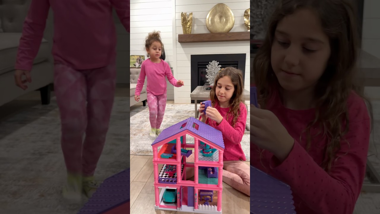 Sierra teaches Rhia to do chores to earn toys