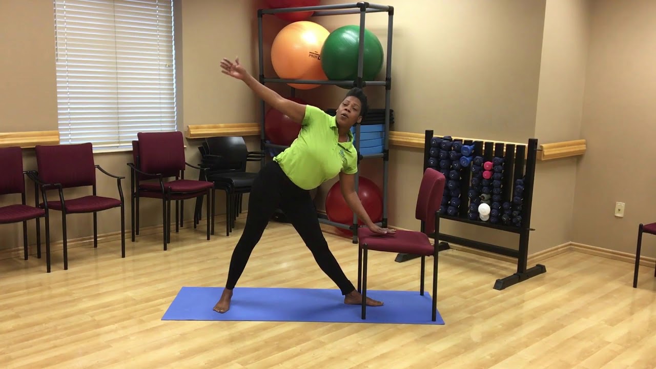 Yoga for Seniors Triangle Pose Using a Chair for Support