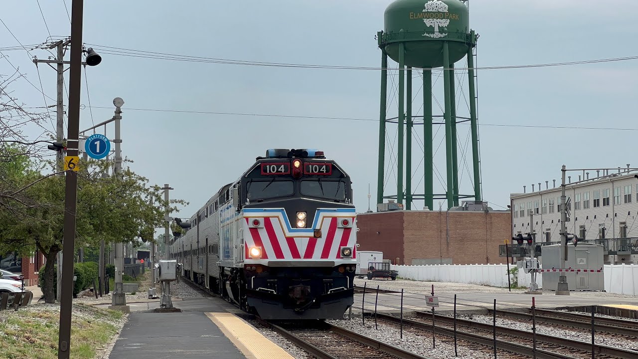 Metra and freight action on the MD-W line at Elmwood Park, IL. 5-12-23