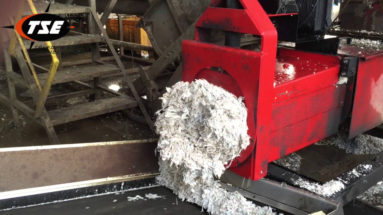 Dirty PE Film being washed then discharging dry material from SCREW PRESS (Telford Smith)