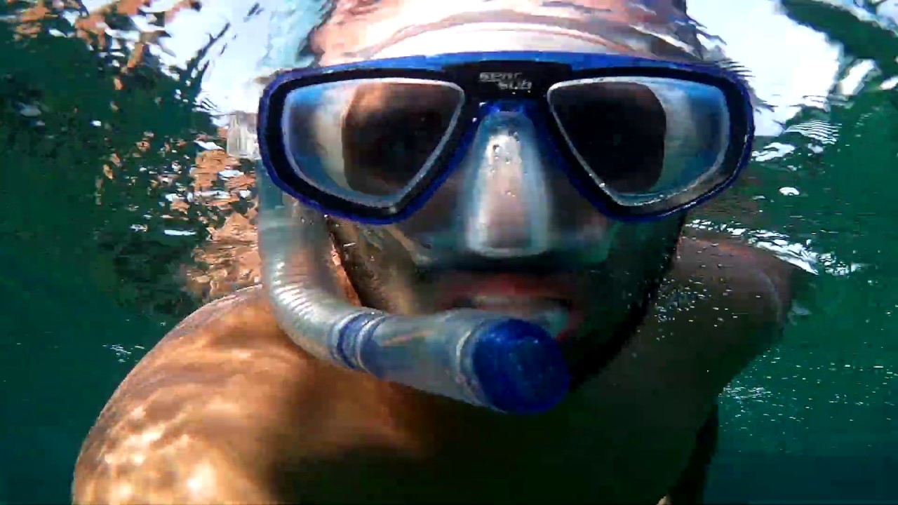 Swimming underwater at spiaggia grande Calasetta