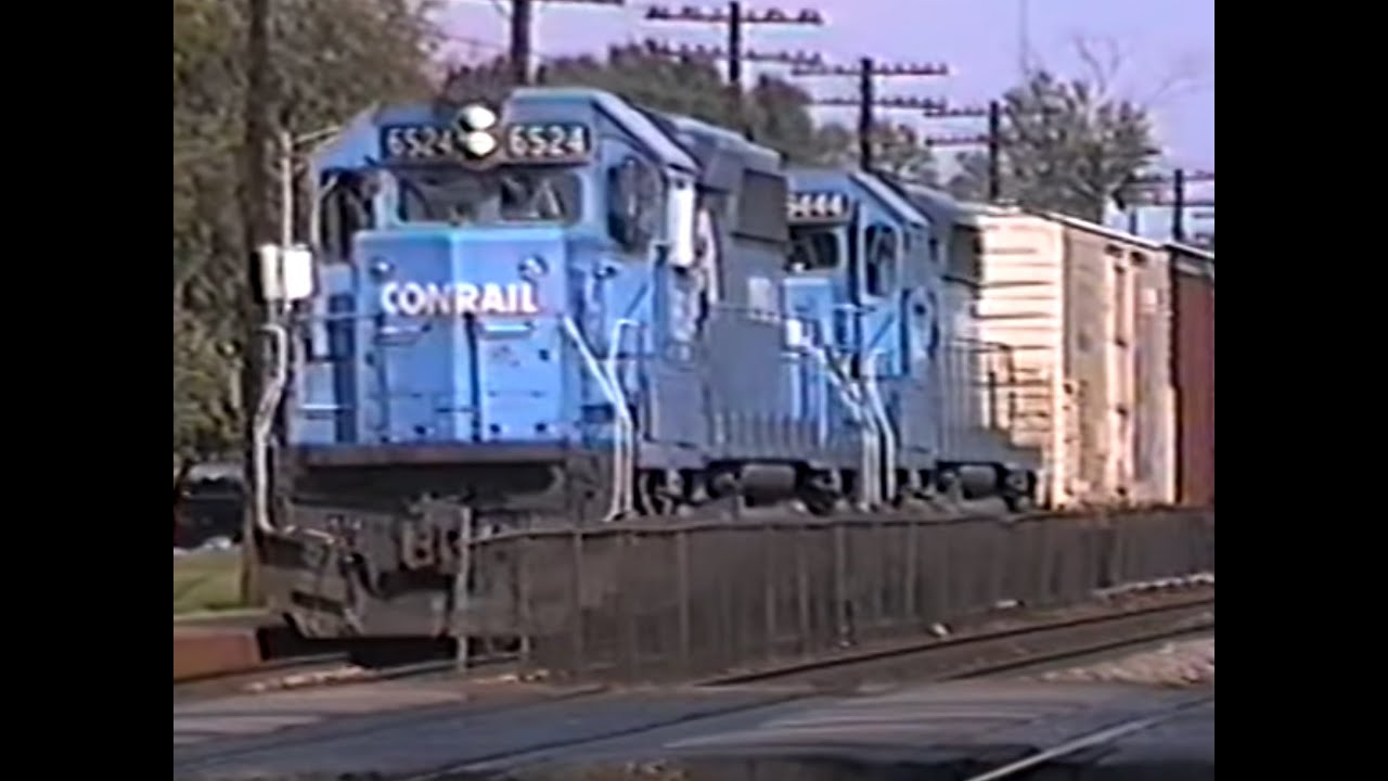 BN Downers Grove. Sept. 1992. Conrail power. Amtrak. E9s.