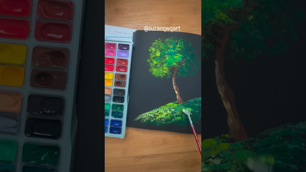 Vibrant colors against black art book #acrylicpainting #artwork #treepainting