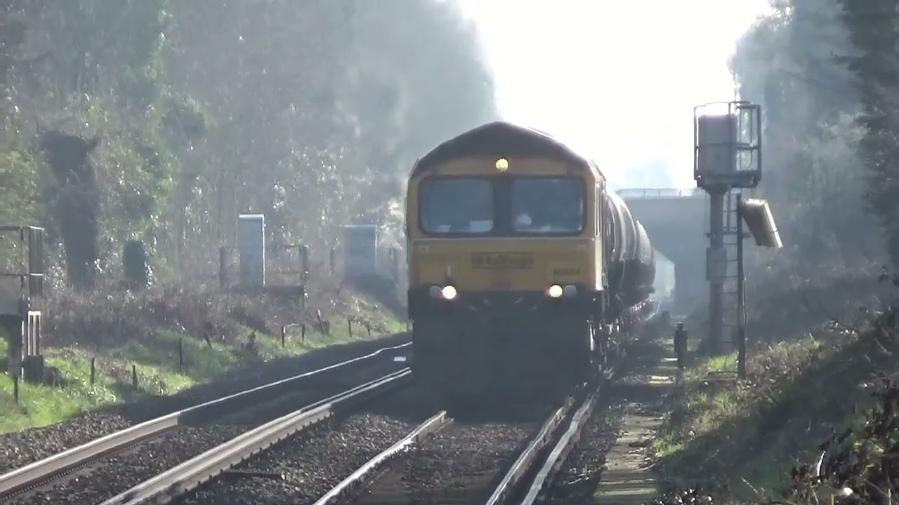 66 694 leads a fuel tank train into sunny Mottingham, 5 Mar 26.