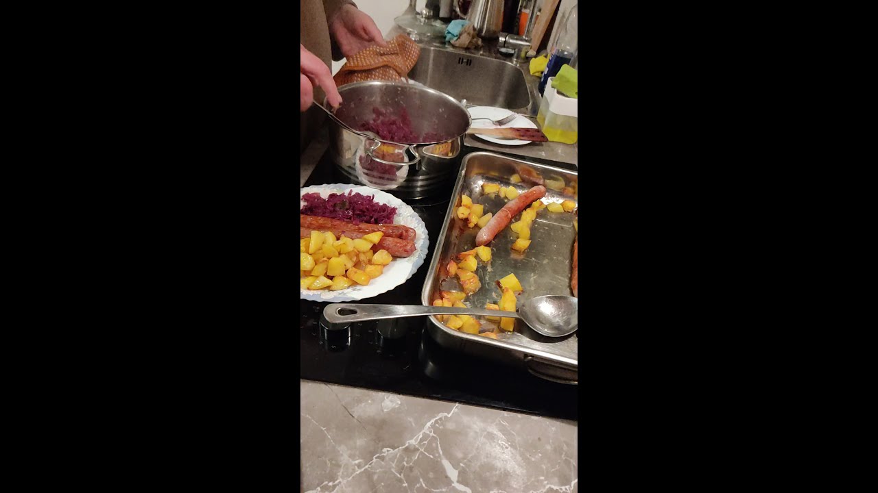 German food: Sausages with red cabbage and potatoes - yummie 