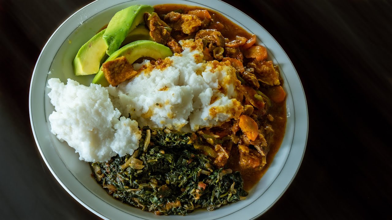 Ugandan recipe Beef Stew, Posho with Greens. This food is typical in Uganda - try this beef recipe