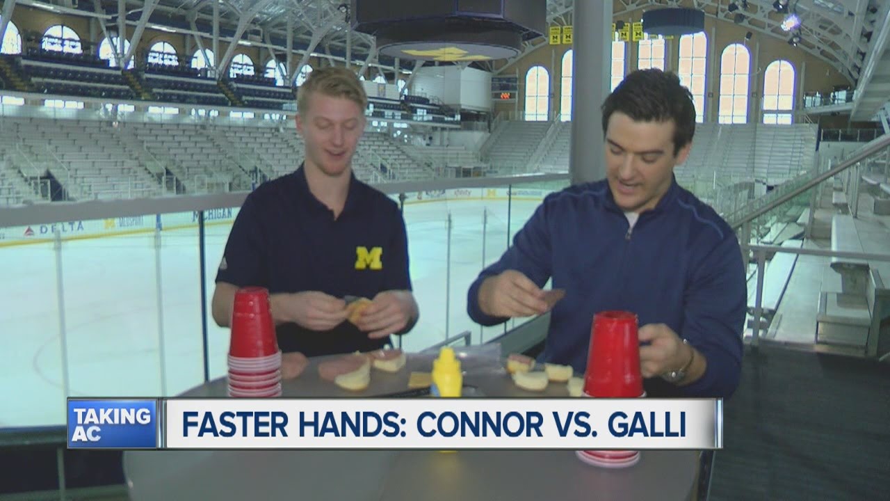 Faster Hands: Michigan's Kyle Connor challenged by Brad Galli to other tests
