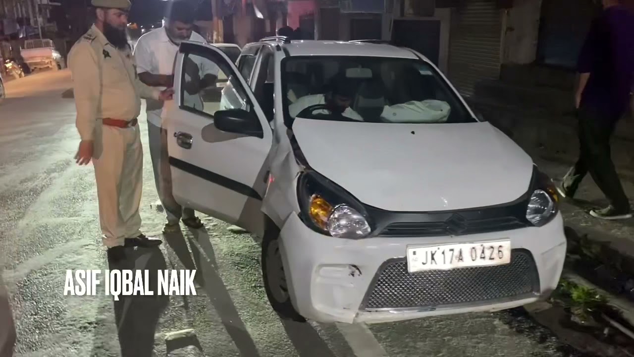 Good Samaritan helping Kishtwar police to clear the block road after head on collision