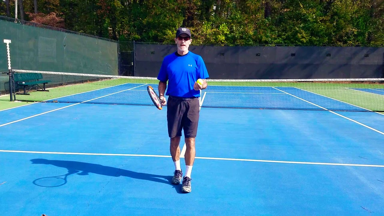 Returning a slice or low ball.