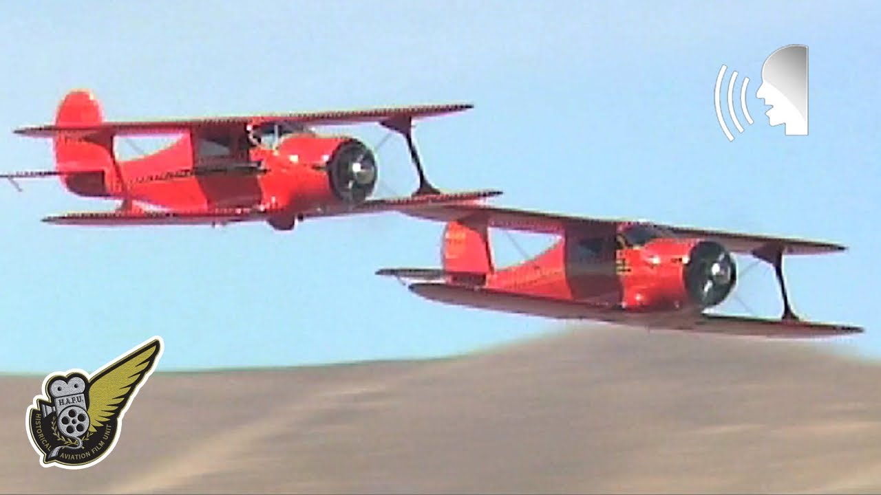 Two elegant Art Deco Beech Model 17 'Staggerwing' aircraft together