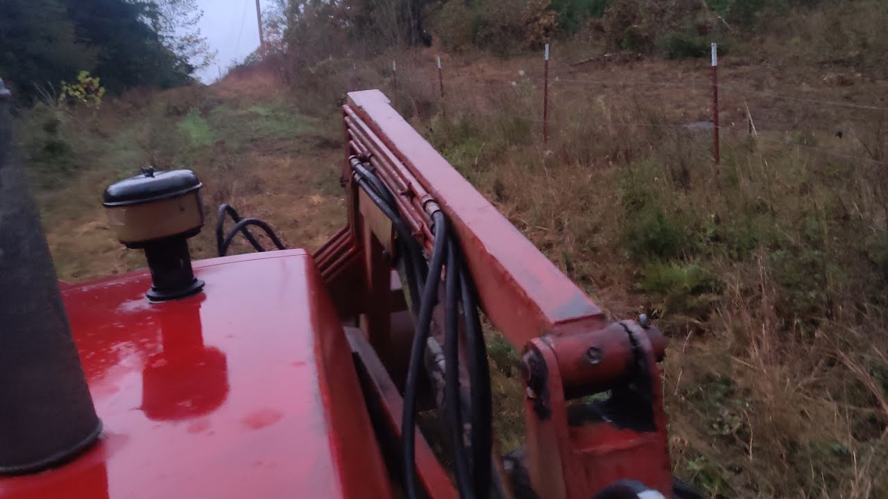 Case  IH 1494 climbing up a hill