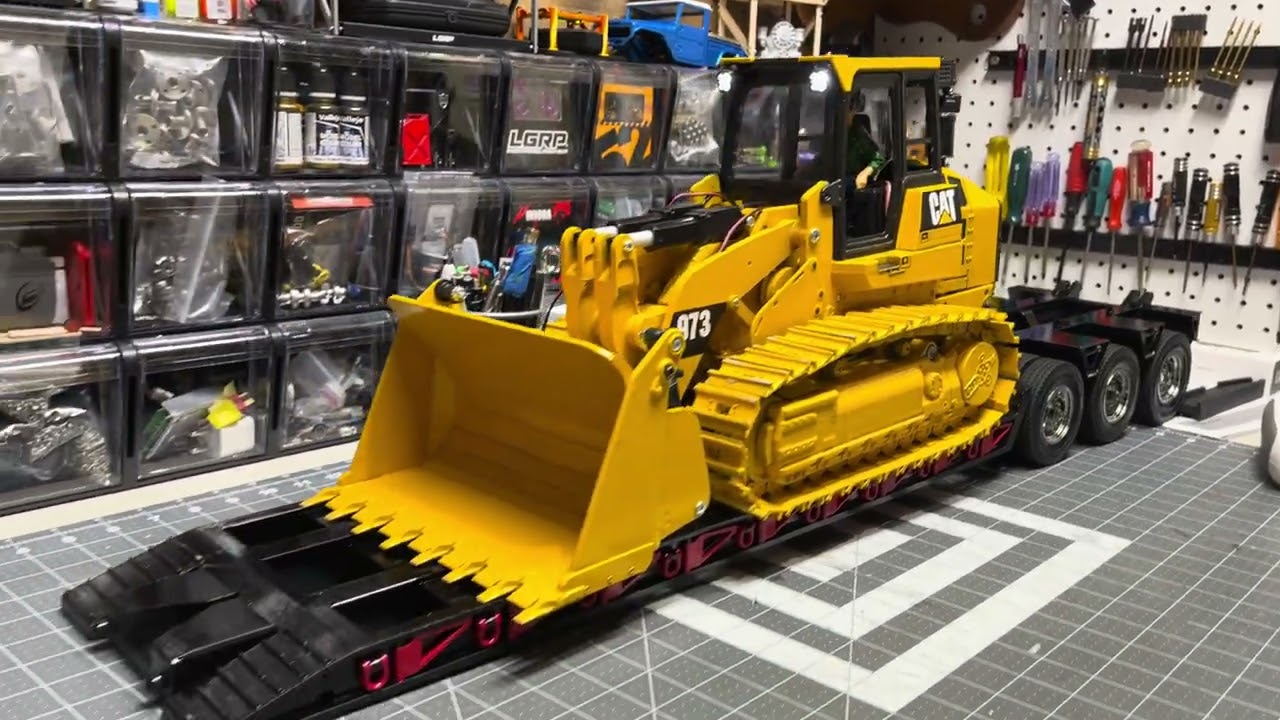 1/14 Semi trucks.  3d printed working lowboy trailer and Cat loader