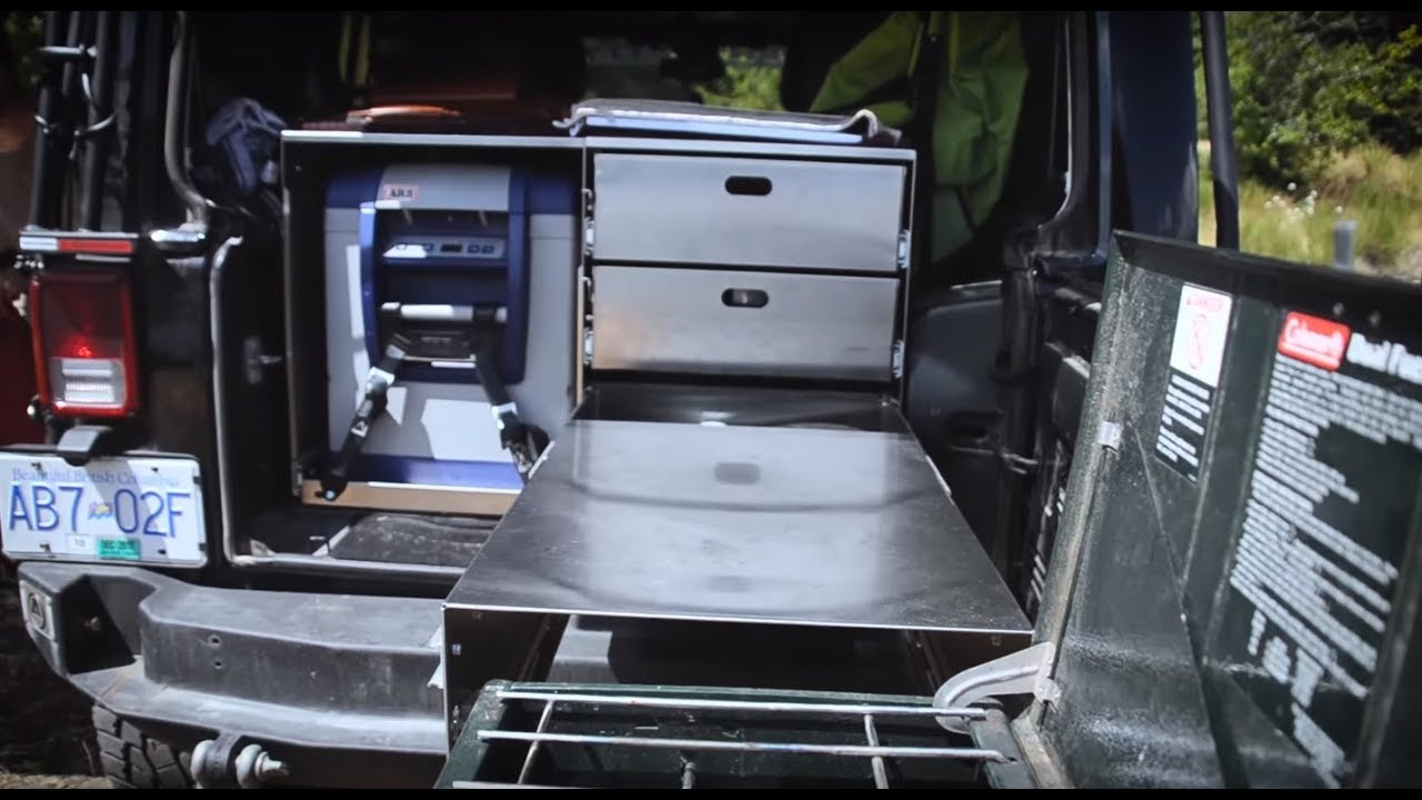 Overland adventure jeep with rooftop tent, and specifically built Kitchen setup.