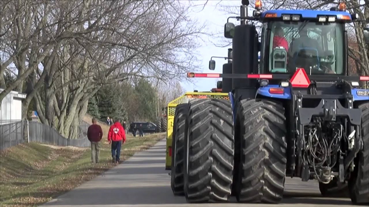 Community members honor young farmer with tractor procession