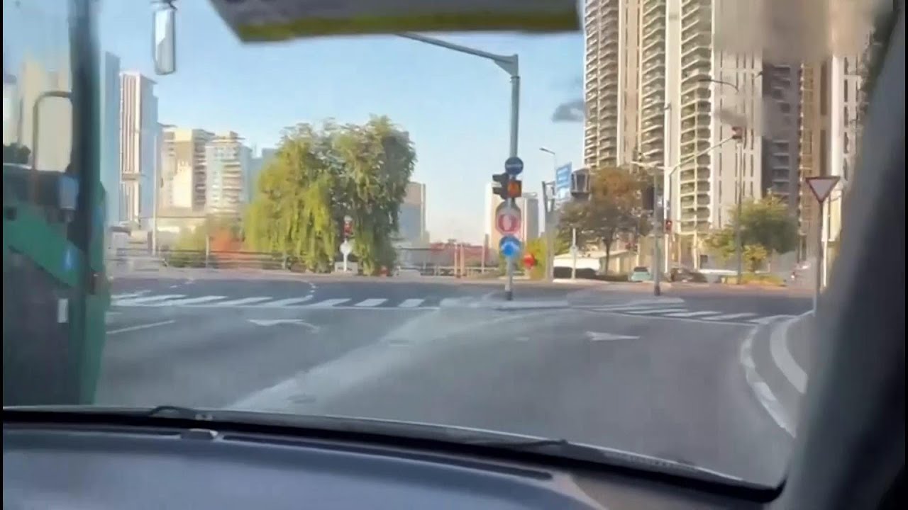 People seek shelter in Tel Aviv after air alert sirens sound across city
