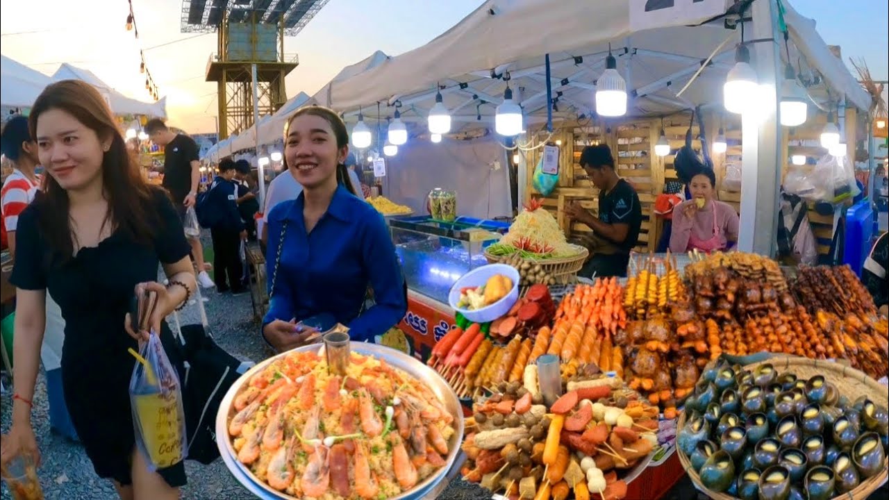 Cambodian street food at Phnom Penh night market - walking tour exploring delicious Khmer foods