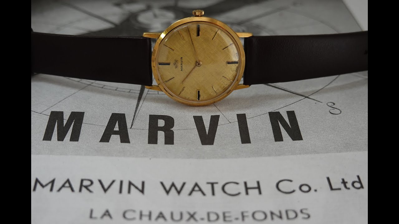 c1964 Marvin 18k Gold men's vintage dress watch with linen dial