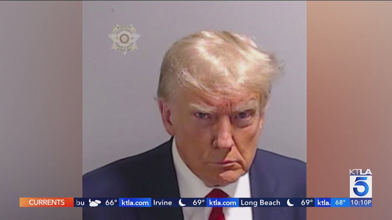 Donald Trump's mugshot makes history after surrender at Fulton County jail