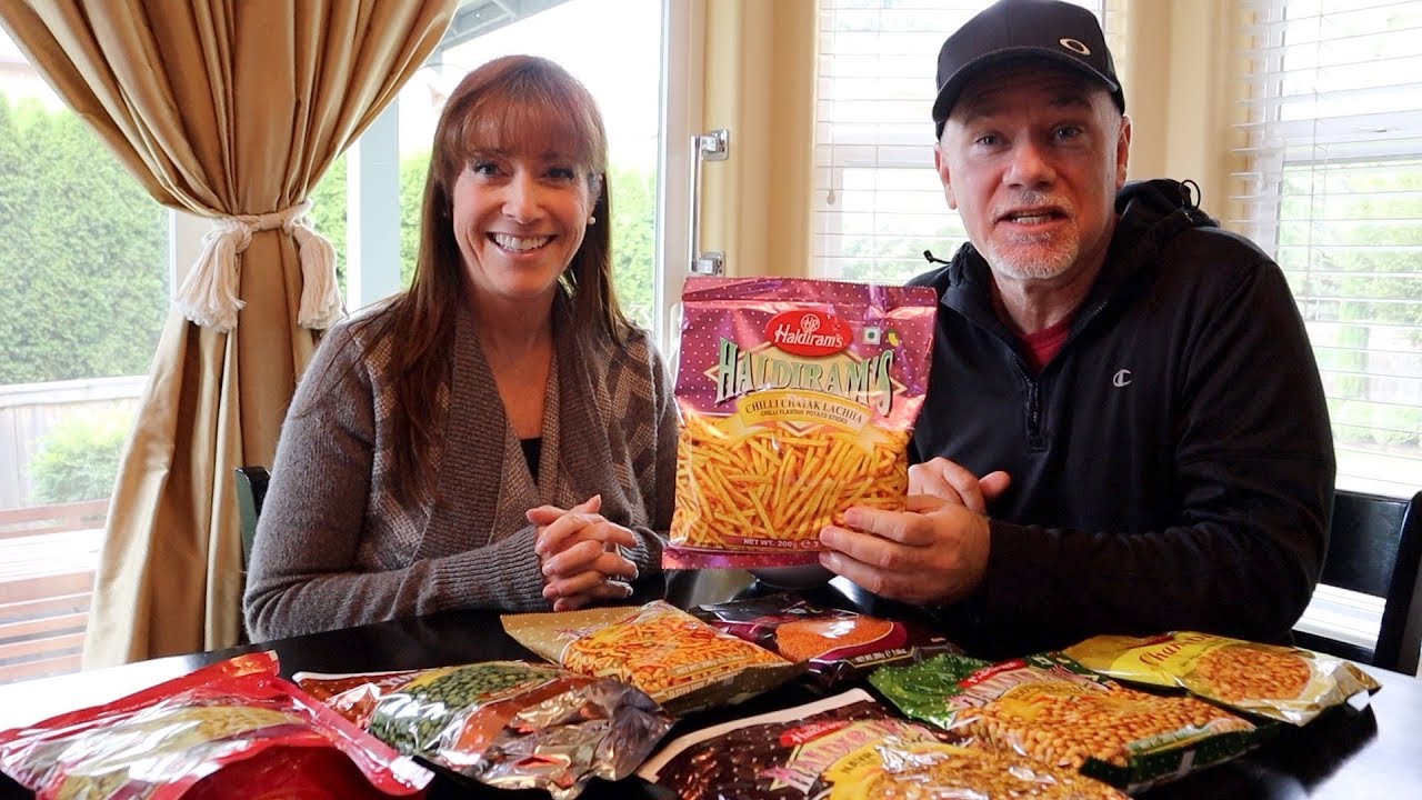 Indian Food In America 🥘 First Time Tasting 10 Haldiram's Snacks
