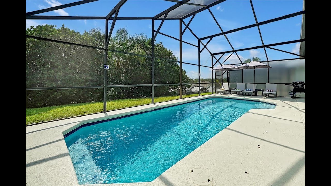 3 Bedroom 2 Bath Orlando villa with South Facing Pool minutes from Disney World.