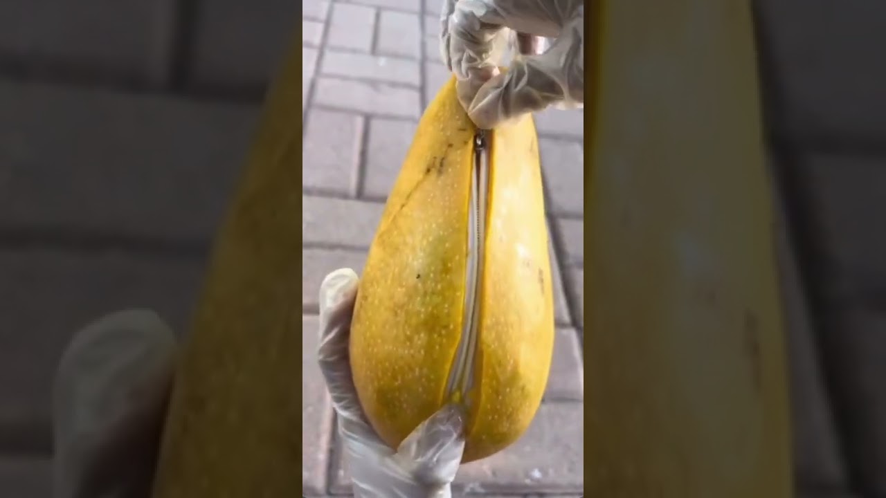 Real or fake mango?#delicious#food#streetfood#sweet#foodlover#foodie#canada#shorts#mango#subscribe