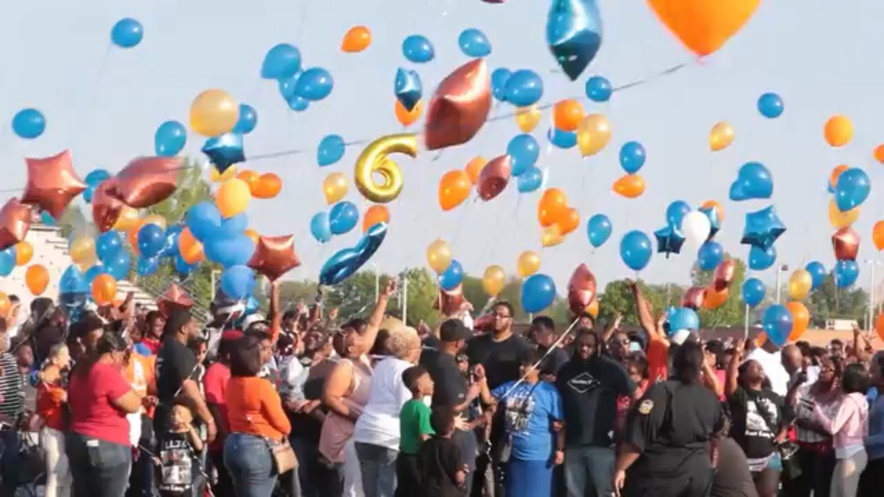 East St. Louis, IL comes together at vigil for teen football star profiled by Sports Illustrated
