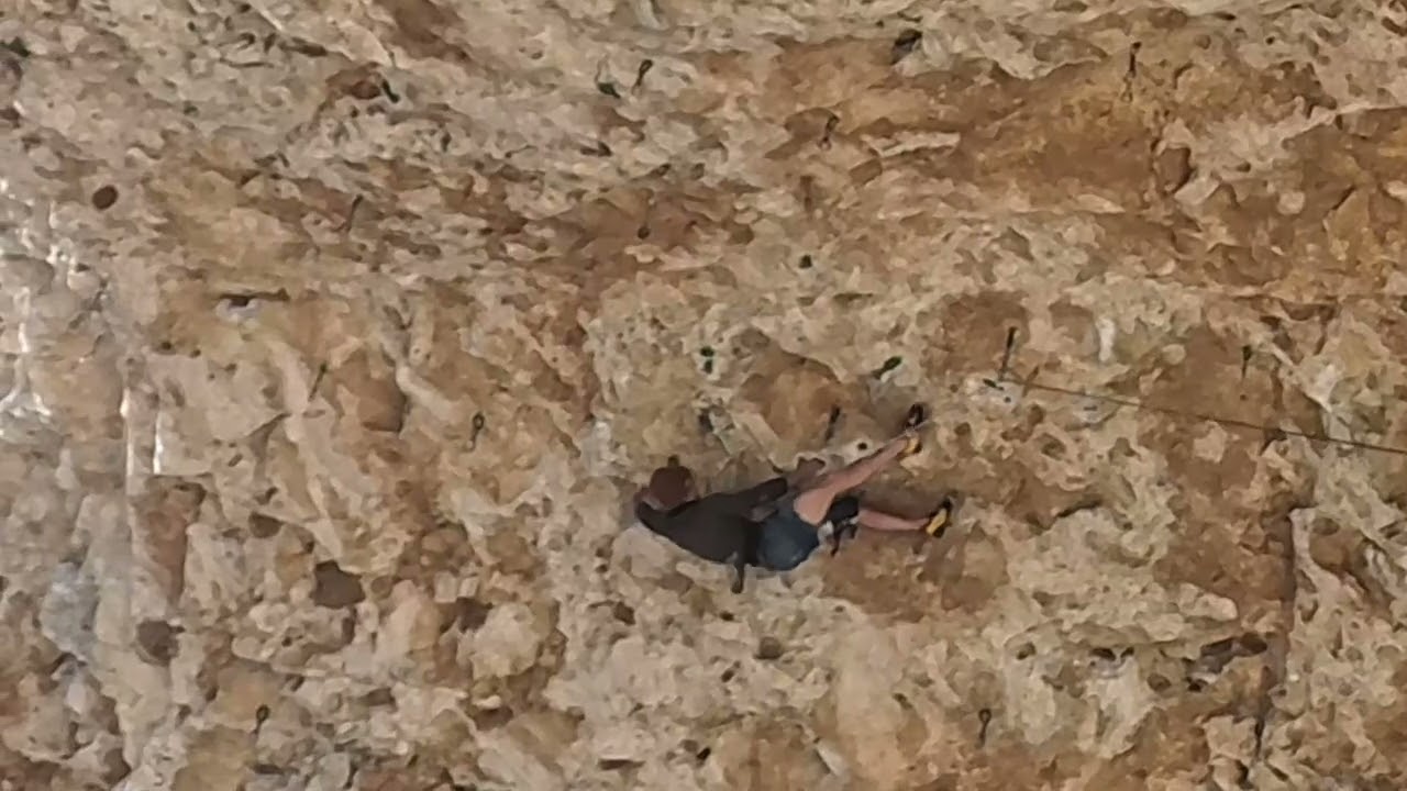 Countdown to Ecstasy (5.13a) at Clear light cave in Mount Potosi