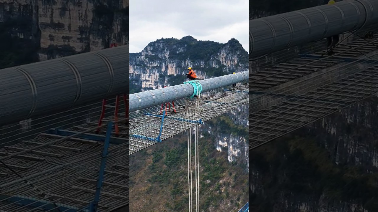 The world's tallest bridge under construction above the Huajiang Grand Canyon in Guizhou. #guizhou