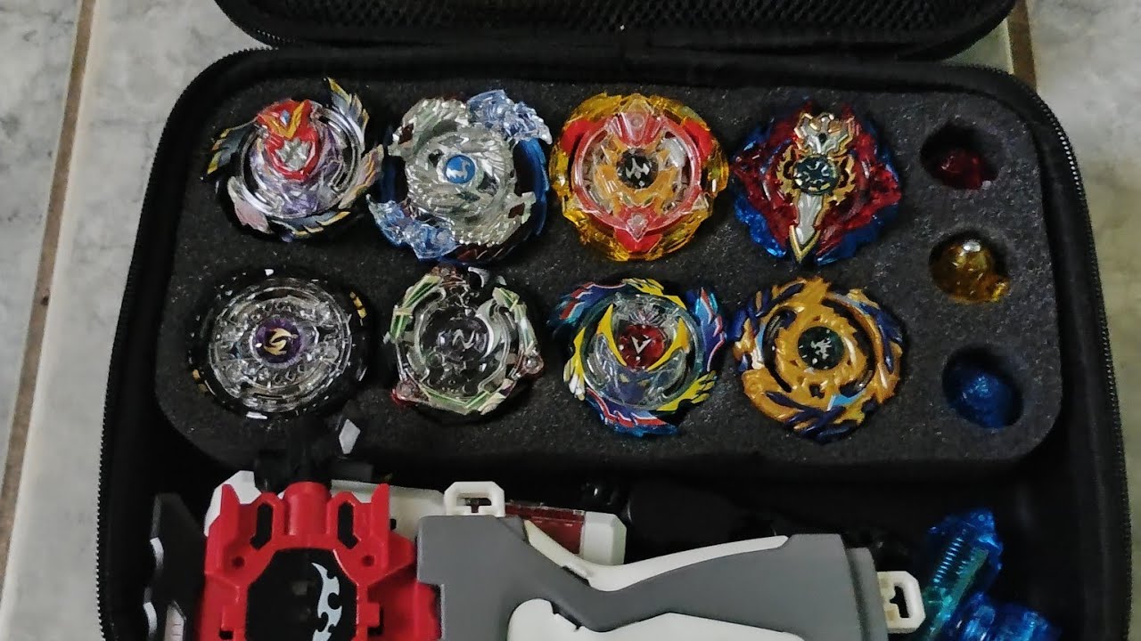 especial de 100 inscritos abrindo a maleta de Beyblade Burst evolution + surpresas
