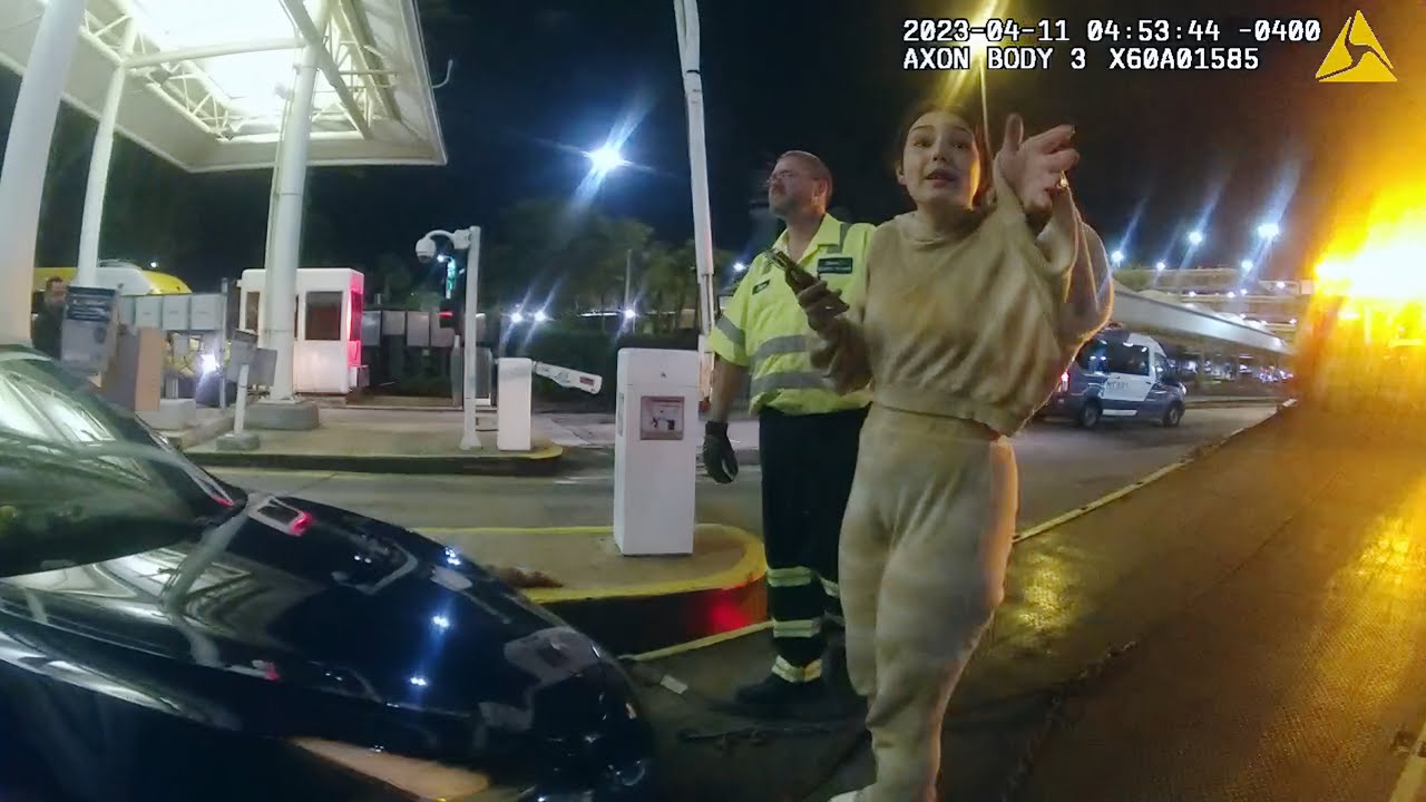 Entitled Airport Employee Tries to Stop Her Car from Being Towed