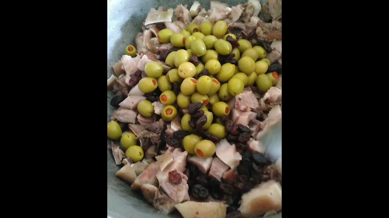 Un rico arroz con cabeza de cerdo.