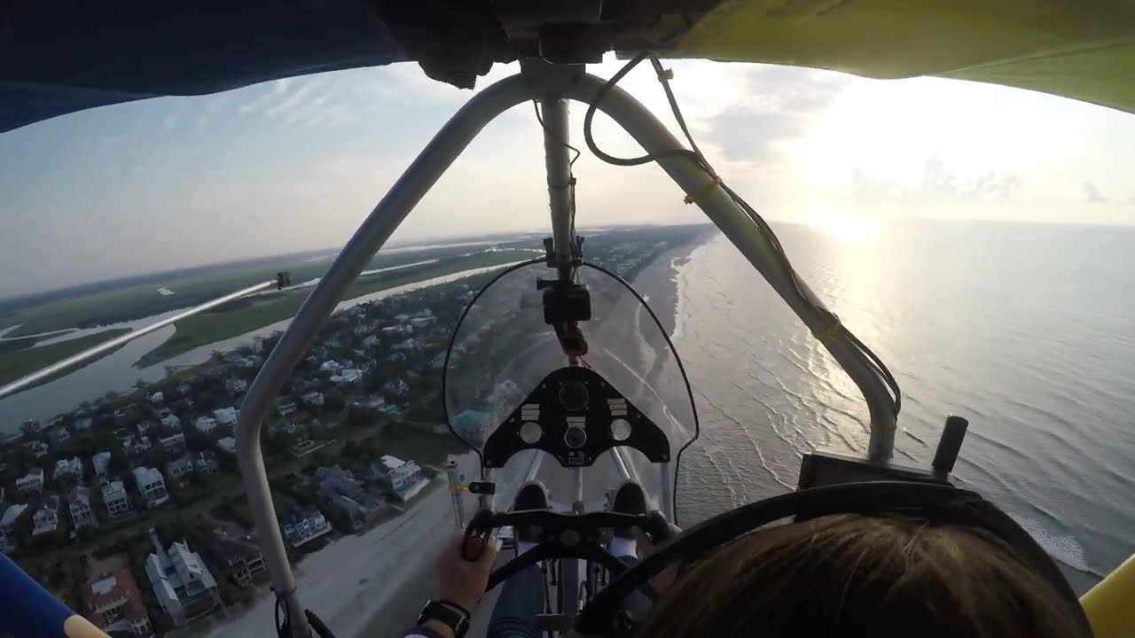 Alina flys over the beach