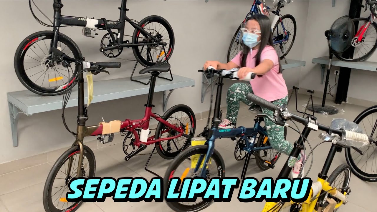 Pixel Beli Sepeda Lipat Baru, Bingung Pilih Warna Kuning atau Biru?