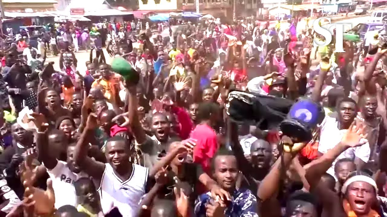 Residents in Guinea's capital celebrate military takeover