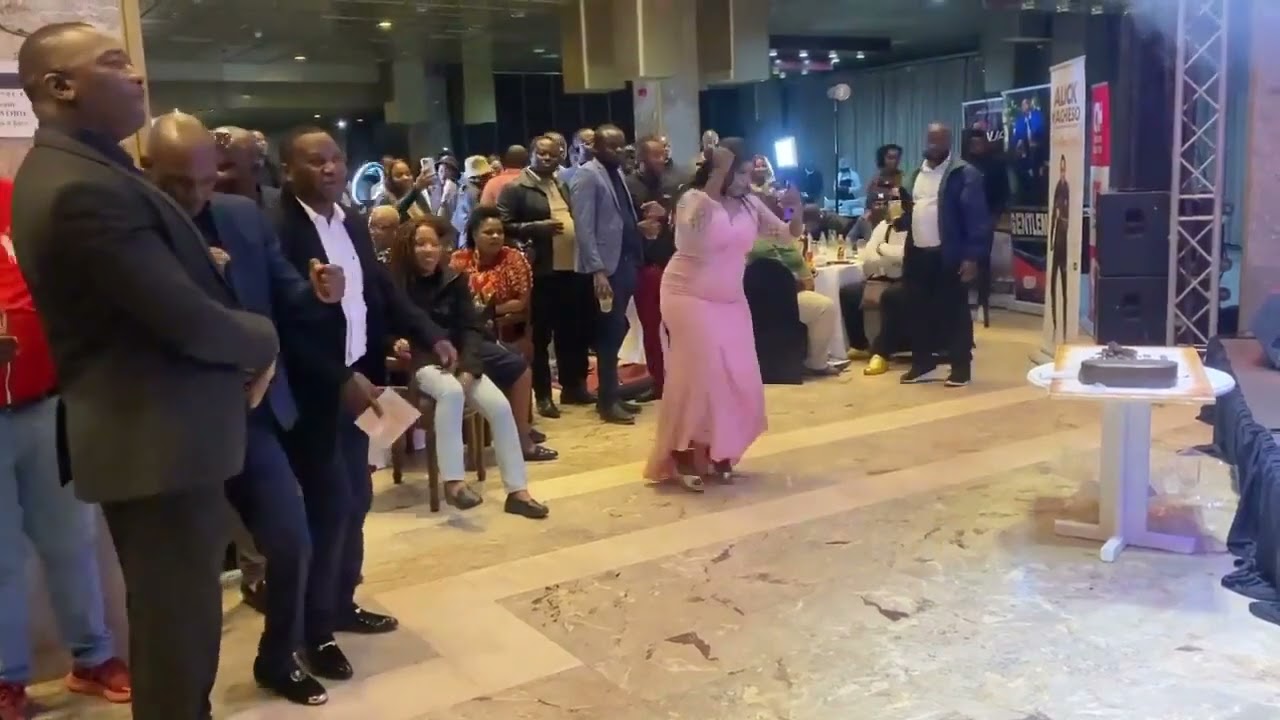 Woman dancing at Aleck Macheso’s executive launch