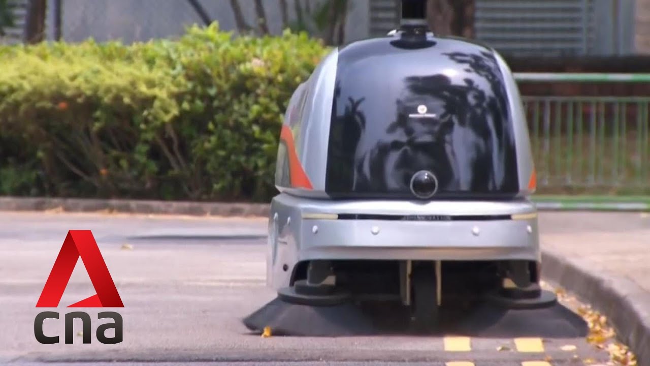 Singapore turns to robots to help firms tide through labour crunch