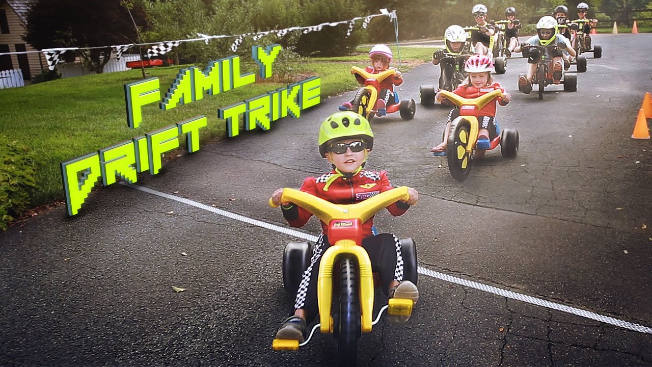 Family Drift Trike Race // Razor Trikes + Family Friendly Water Slide