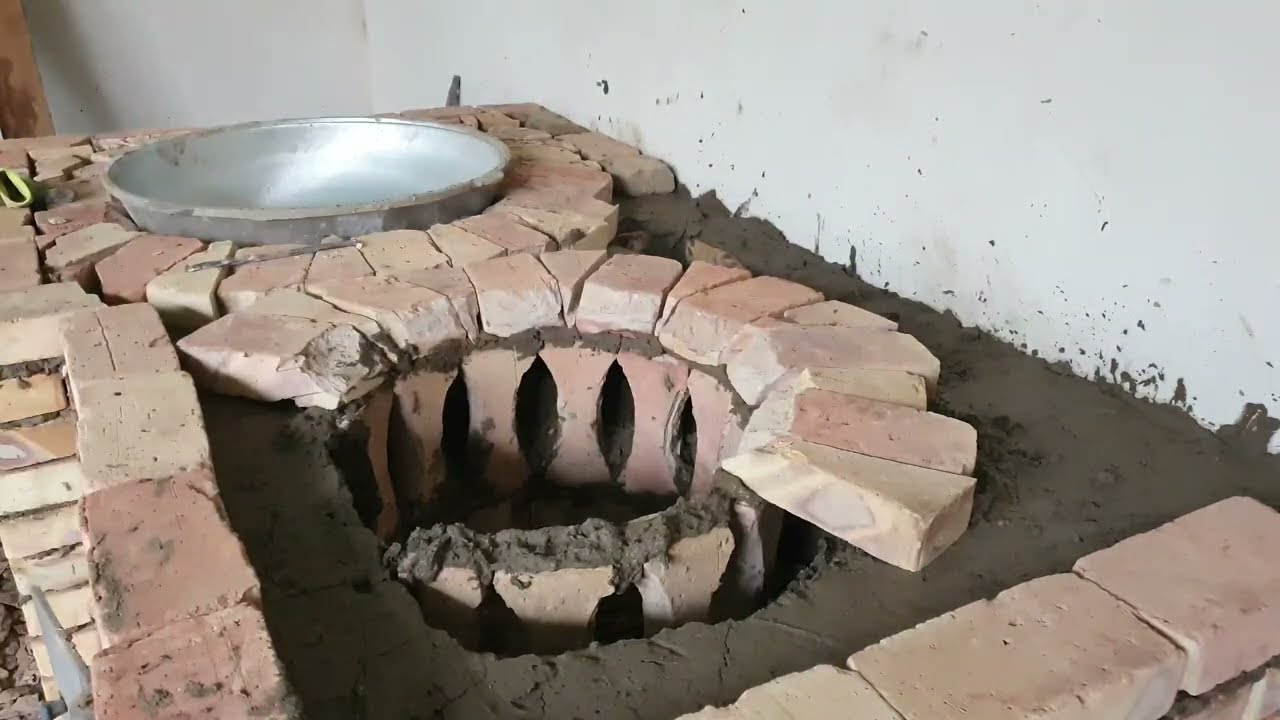 Professional Craftsmen Installing Modern Fireplaces and Stoves