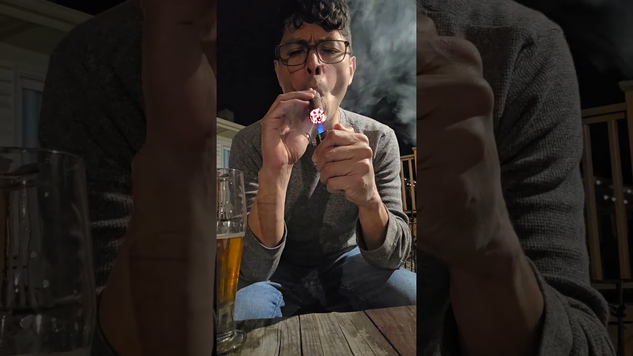 Kristania cigar by Kristoff cigars with a Belgian-style pale ale
