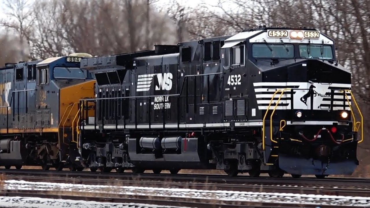 What! New NS Engine Leading CSX Train! Goofy RR Crossing Gates! Two 2 Mile Long CSX Trains Meet! DPU
