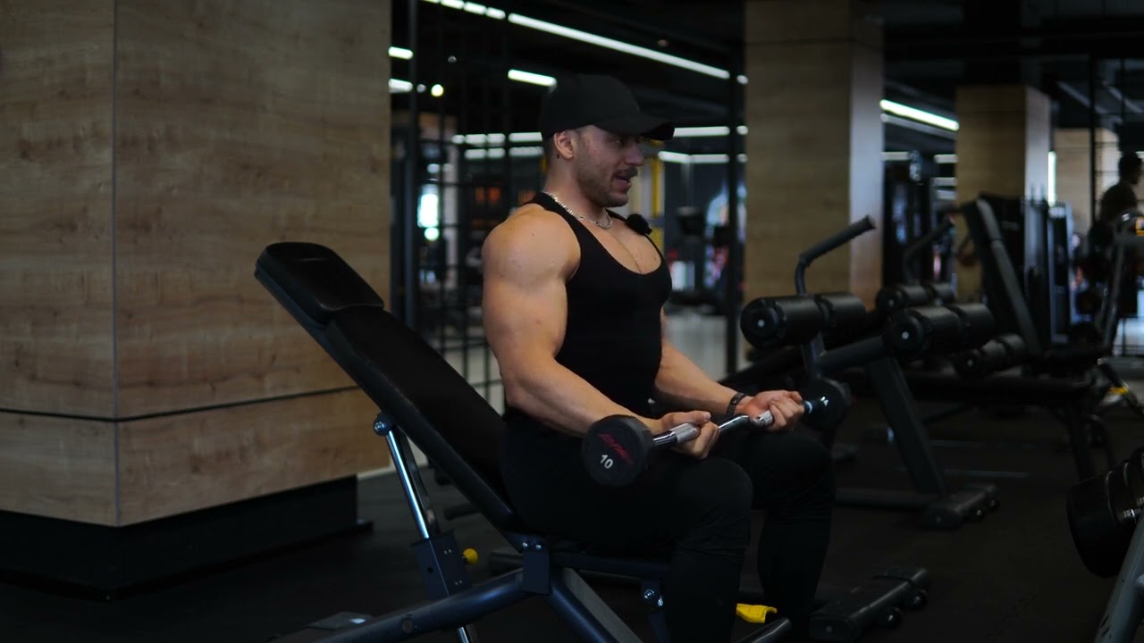 كيل شفت زت جالس - seated ez bb biceps curls