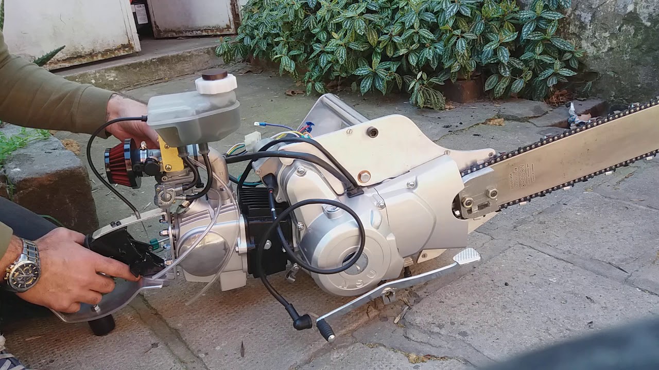 Four stroke chainsaw hand made first fire up. (not finished in this video)