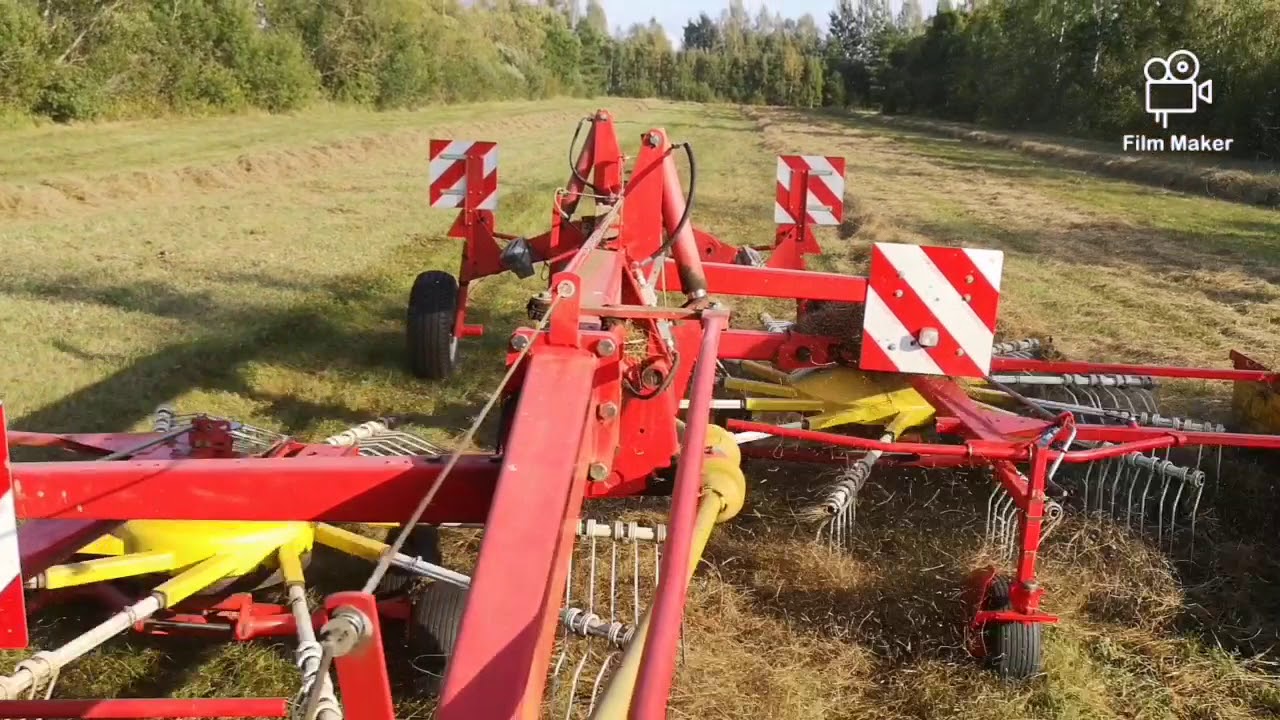 Making hay  step 3 Raking hay,  Belarus 920.3 and PÖTTINGER EUROTOP 651 Rotary rakes