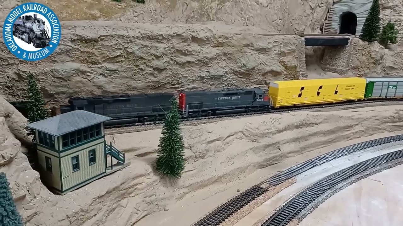 Western Pacific and Cotton Belt auto parts train running through the second level of the mountains