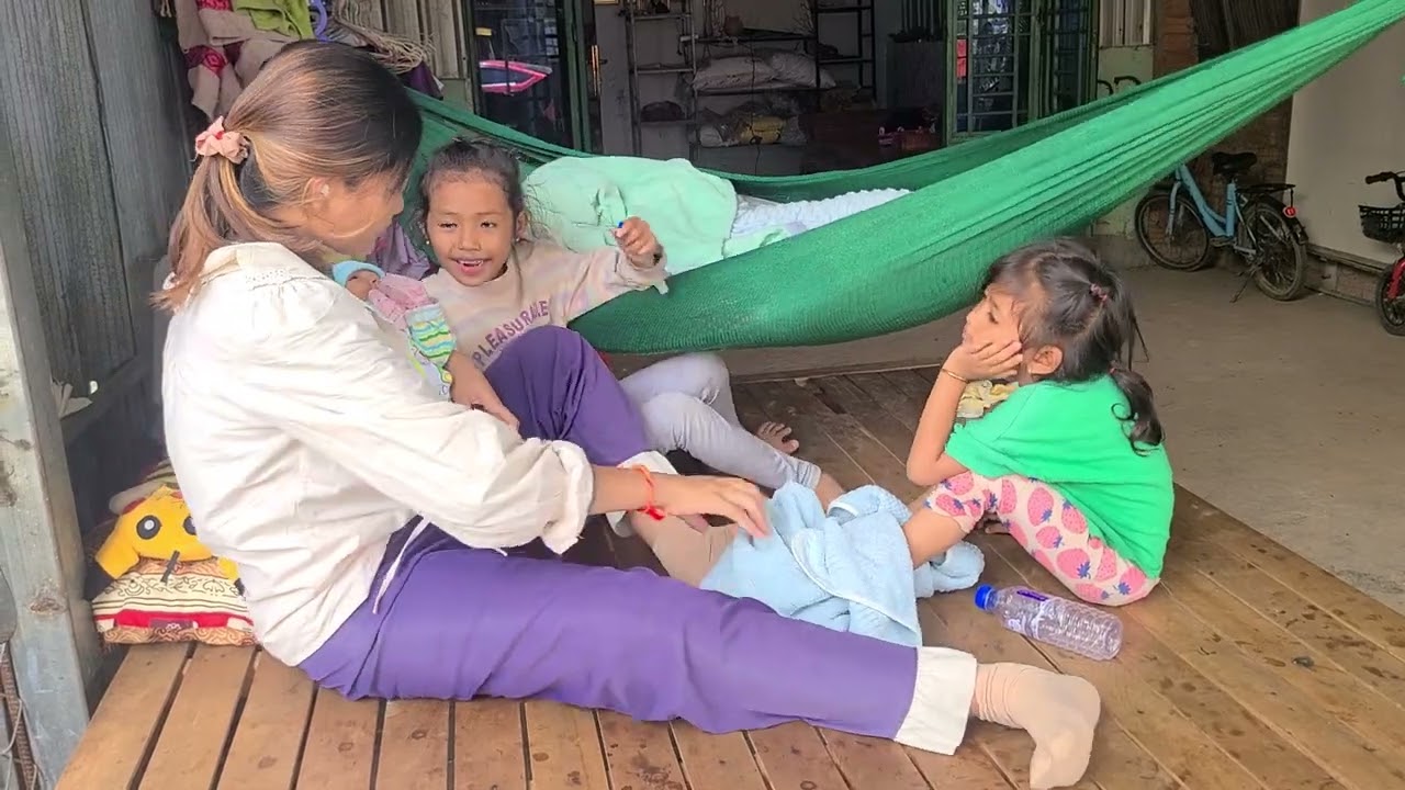 Mom takes care of small children while with children