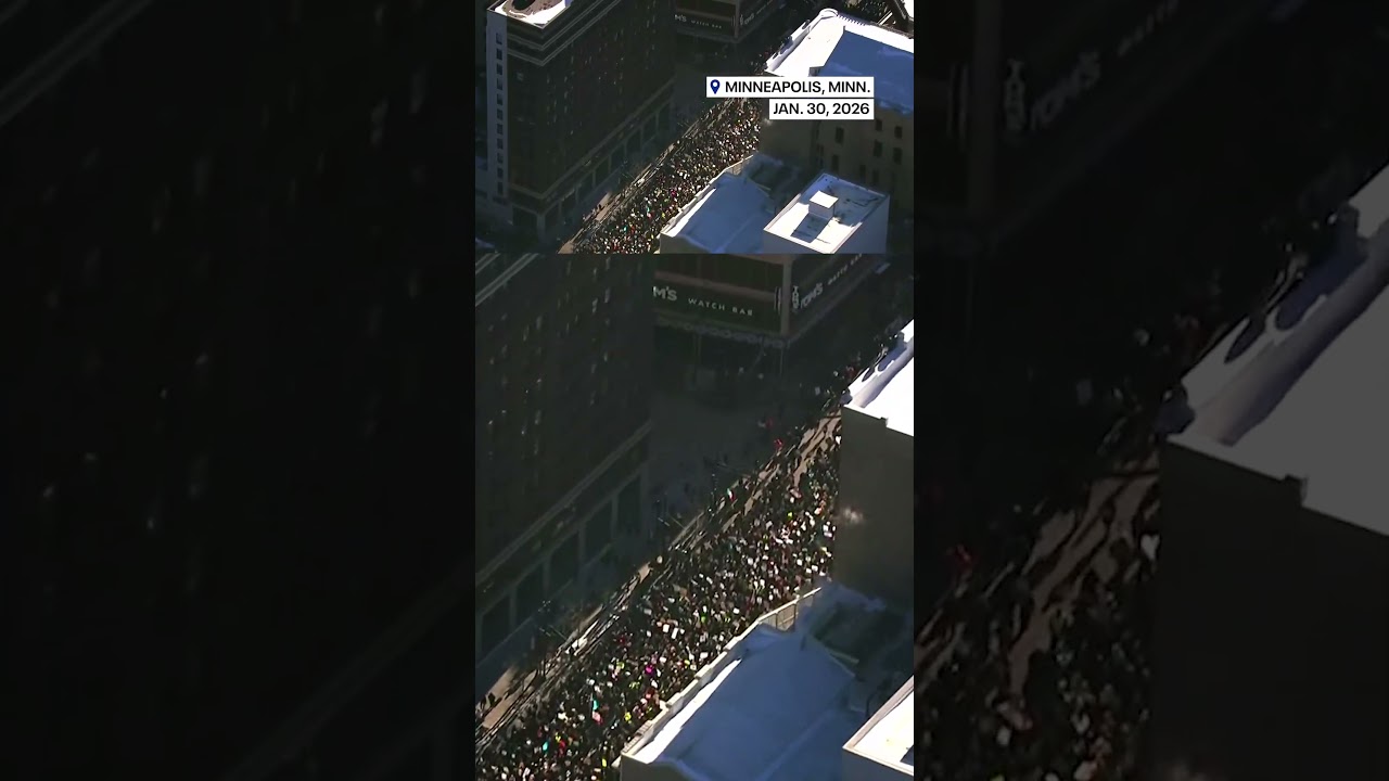 Thousands of protesters march down the streets of Minneapolis to protest ICE