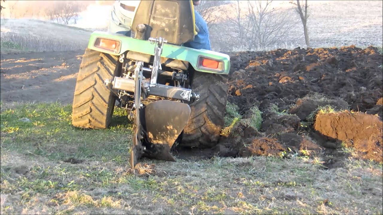 John Deere 316 plowing with Brinly Plow
